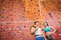 Fit couple at the rock climbing wall Royalty Free Stock Photo