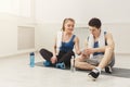 Fit couple with smartphone listening to music Royalty Free Stock Photo