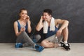 Fit couple with smartphone listening to music Royalty Free Stock Photo