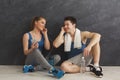 Fit couple with smartphone listening to music Royalty Free Stock Photo