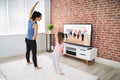 Family Doing Home Online Stretching Yoga Fitness Exercise