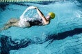 Fit female swimmer doing the back stroke Royalty Free Stock Photo