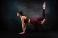 fit female yoga instructor in sportwear make strength fitness exercises at home studio Royalty Free Stock Photo