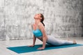 Fit flexible woman practicing yoga indoors Royalty Free Stock Photo