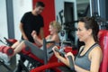 Fit girl doing lunges with smith machine Royalty Free Stock Photo