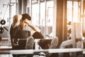 Fit handsome caucasian man sit up on machine in sportswear. Young man sit up exercise to strengthen Royalty Free Stock Photo