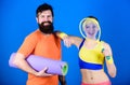 Fit and healthy. Healthy lifestyle concept. Man and woman couple in love with yoga mat and sport equipment. Fitness Royalty Free Stock Photo