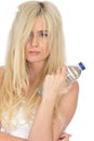 Fit Healthy Young Natural Blonde Woman Holding a Bottle of Mineral Water Royalty Free Stock Photo