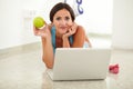 Fit hispanic woman using her laptop Royalty Free Stock Photo