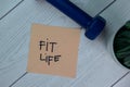 Fit Life write on sticky notes isolated on Wooden Table Royalty Free Stock Photo