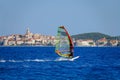 Tourist on active vacation kitesurfs along the coastline of Korcula island.