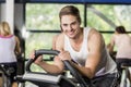 Fit man doing exercise bike Royalty Free Stock Photo