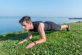 Fit man doing plank core exercise working on abdominal back muscles Royalty Free Stock Photo