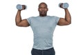 Fit man exercising with dumbbell Royalty Free Stock Photo