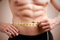 Fit Man Measuring His Waist Royalty Free Stock Photo