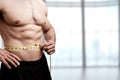 Fit Man Measuring His Waist Royalty Free Stock Photo