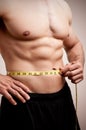 Fit Man Measuring His Waist Royalty Free Stock Photo