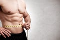 Fit Man Measuring His Waist Royalty Free Stock Photo