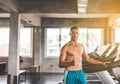 Fit man standing and thumb up relax after the training session in gym,Concept healthy and lifestyle,Male taking a break after exer Royalty Free Stock Photo