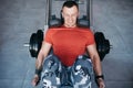 Fit man training legs on leg press machine in the gym Royalty Free Stock Photo