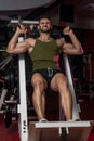 Fit Man Using The Leg Press Machine At A Health Club Royalty Free Stock Photo