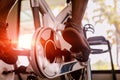 Fit man working out on exercise bike at the gym. Healthy and funny lifestyle concept