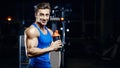 Fit man at workout in gym with shaker Royalty Free Stock Photo