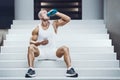 Fit man at workout in gym with shaker Royalty Free Stock Photo
