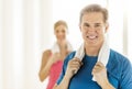 Fit Mature Woman Holding Towel Around Neck At Home Royalty Free Stock Photo