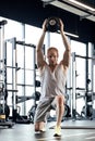 Fit and muscular man exercising with medicine ball at gym. Royalty Free Stock Photo