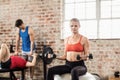 Fit people do some weightlifting together Royalty Free Stock Photo