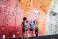 Fit people getting ready to rock climb Royalty Free Stock Photo