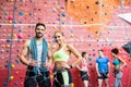 Fit people getting ready to rock climb Royalty Free Stock Photo