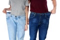 Fit people in oversized jeans on white background, closeup.