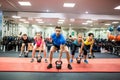 Fit people working out in fitness class Royalty Free Stock Photo