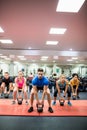 Fit people working out in fitness class Royalty Free Stock Photo