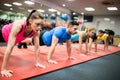 Fit people working out in fitness class Royalty Free Stock Photo