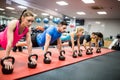 Fit people working out in fitness class Royalty Free Stock Photo