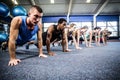 Fit people working out in fitness class Royalty Free Stock Photo