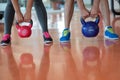 Fit people working out in fitness class at the gym Royalty Free Stock Photo