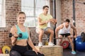 Fit people working out in gym Royalty Free Stock Photo