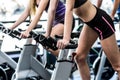 Fit people working out at spinning class Royalty Free Stock Photo