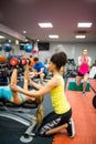 Fit people working out in weights room Royalty Free Stock Photo