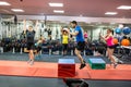 Fit people working out in weights room Royalty Free Stock Photo