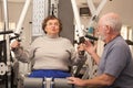 Fit Senior Adult Couple Working Out Together in the Gym Royalty Free Stock Photo