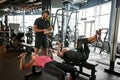 Fit senior couple working out together at gym Royalty Free Stock Photo