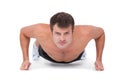 Fit shirtless man doing push ups Royalty Free Stock Photo
