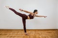 Fit sport caucasian female trainer show streching exercise on floor