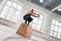 Strong fitness man doing jump exercises on box in gym Royalty Free Stock Photo