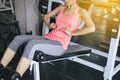 Fit woman doing situp or crunches in gym,Female exercise muscular her stomach Royalty Free Stock Photo